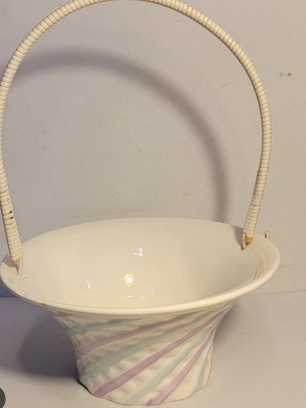 Ivory Ceramic Basket with Pastel Swirl Accents